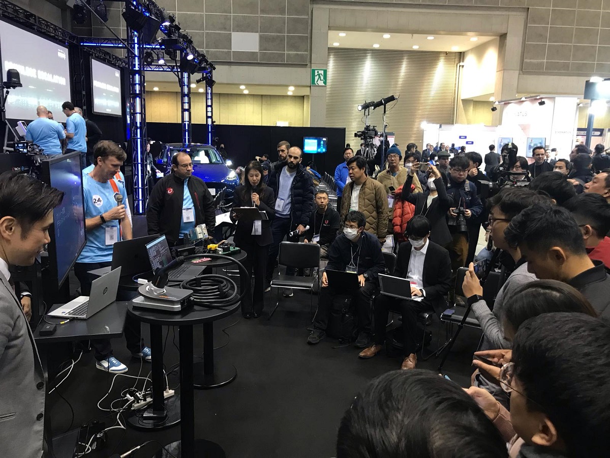 Figure 3. Researchers from the ZDI demonstrating two EV charger vulnerabilities