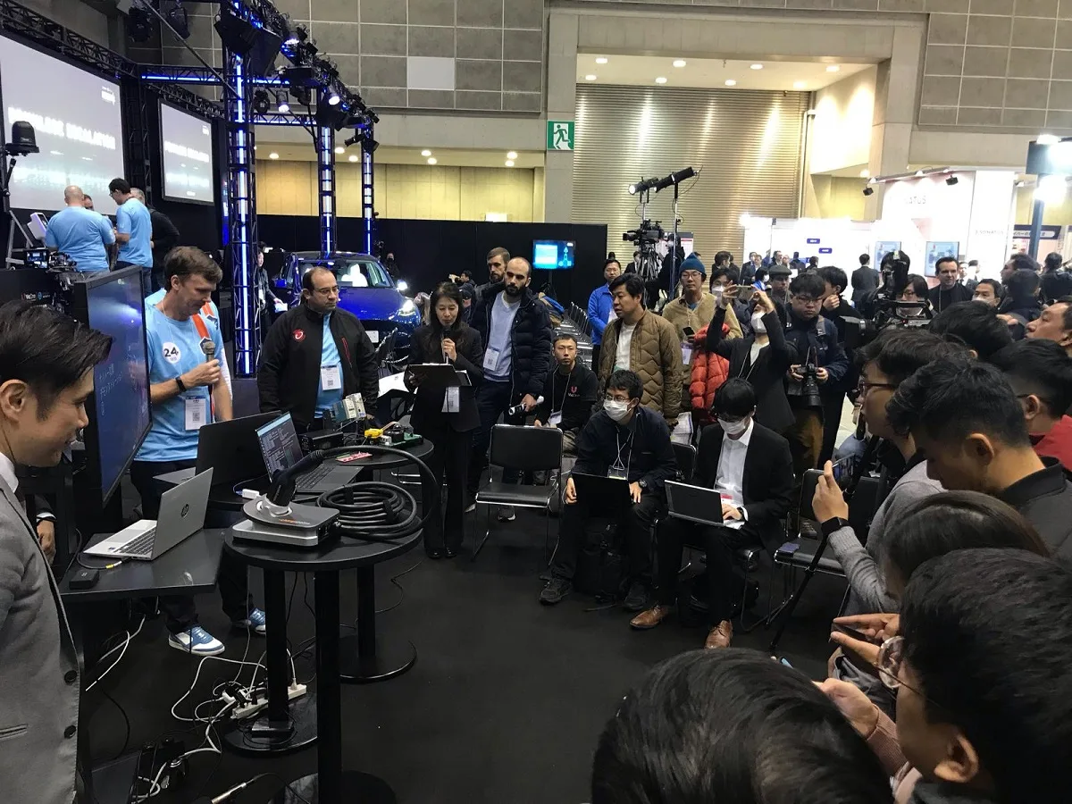 Figure 3. Researchers from the ZDI demonstrating two EV charger vulnerabilities