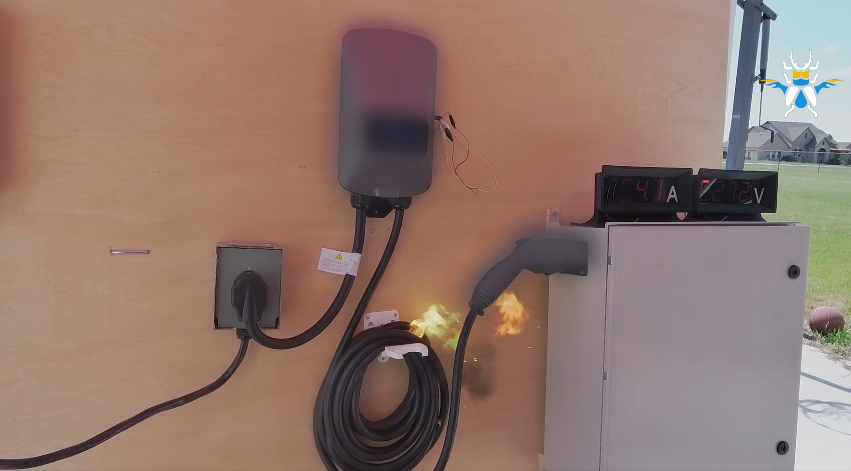 Figure 1. The charging cable of an EV charger burst into flames after the device exceeded its rated current, triggering a thermal runaway. 
Image courtesy of Trend Zero Day Initiative™ (ZDI) 